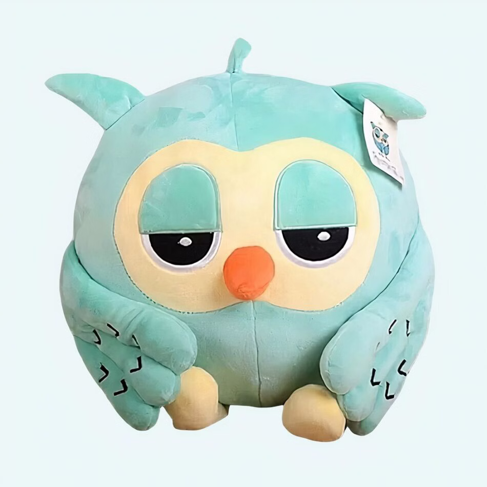 Peluche oiseau vert الجم